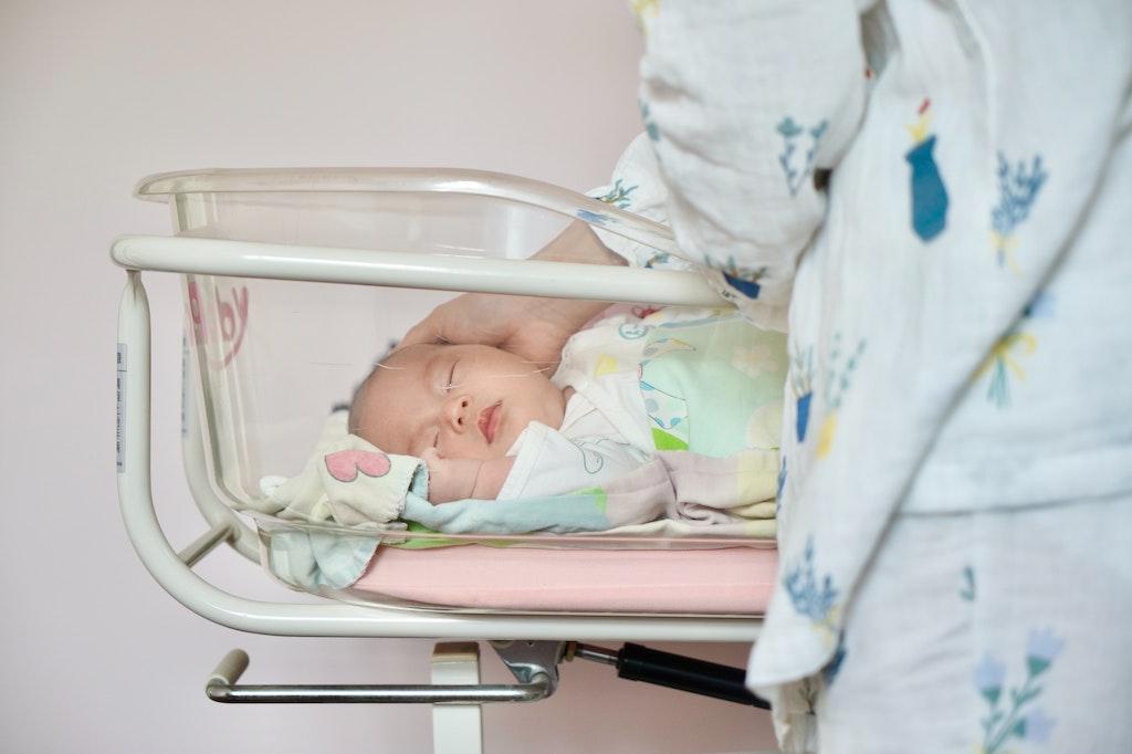 Image of a newborn baby sleeping peacefully in a hospital cart emphasising the vulnerability of the victims in the Lucy Letby case