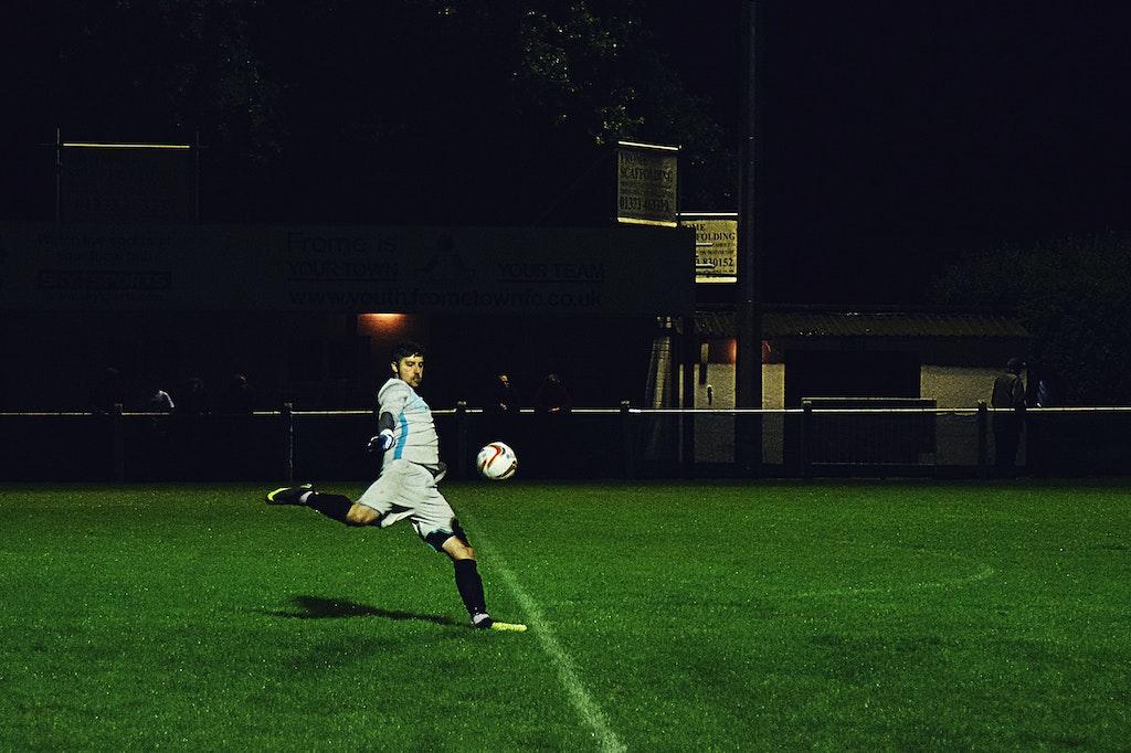 Image of person kicking football who has been inspired by Cole Palmer in the Man City vs Sevilla match